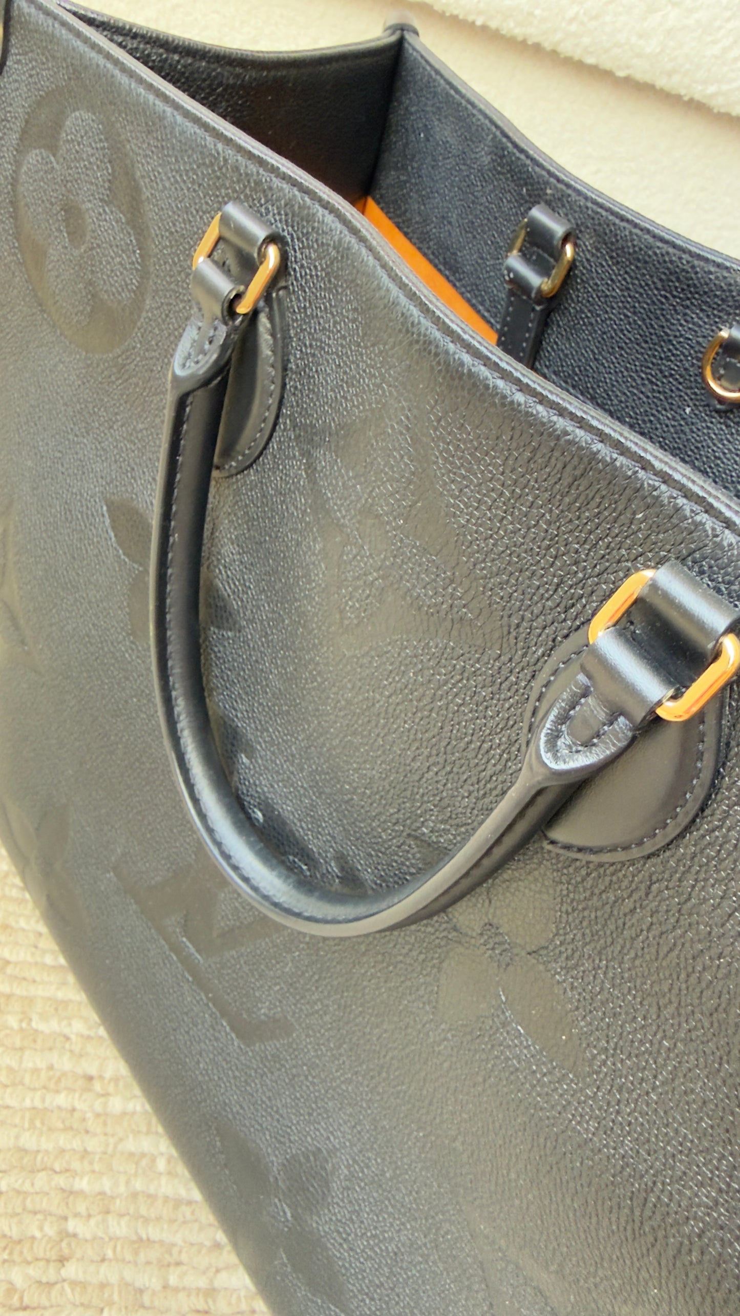 ONTHEGO GM BLACK EMPREINTE BAG