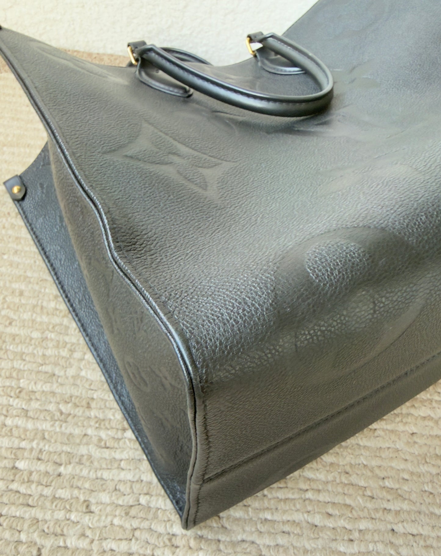 ONTHEGO GM BLACK EMPREINTE BAG
