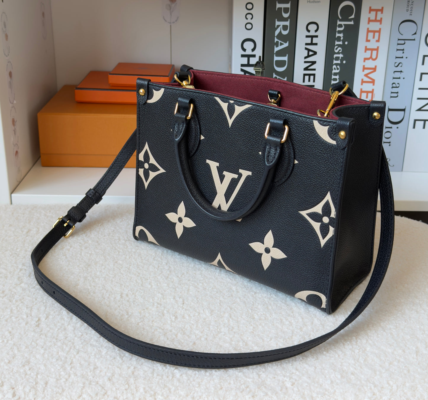 ONTHEGO PM BLACK/BEIGE EMPREINTE BAG