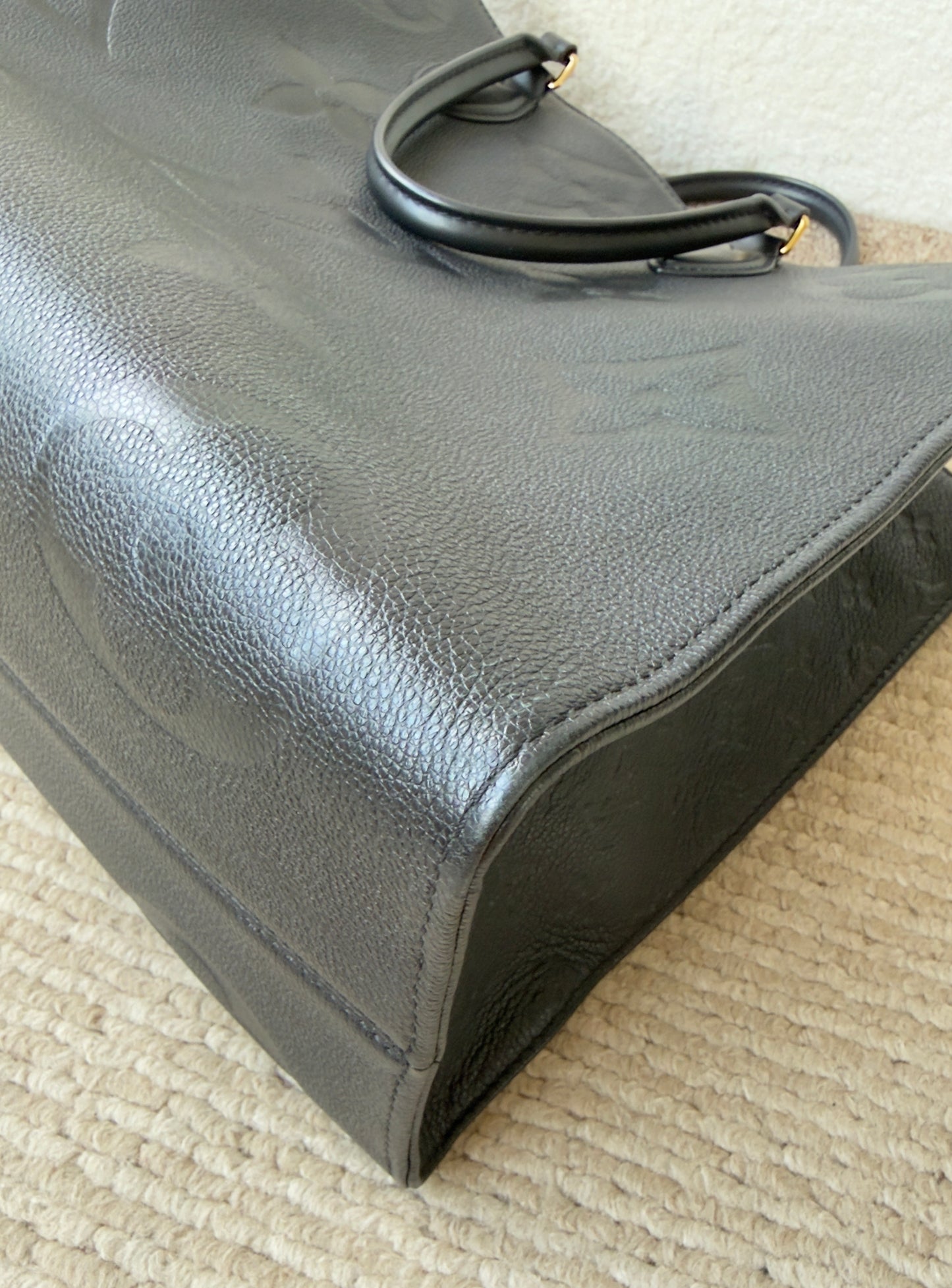 ONTHEGO GM BLACK EMPREINTE BAG