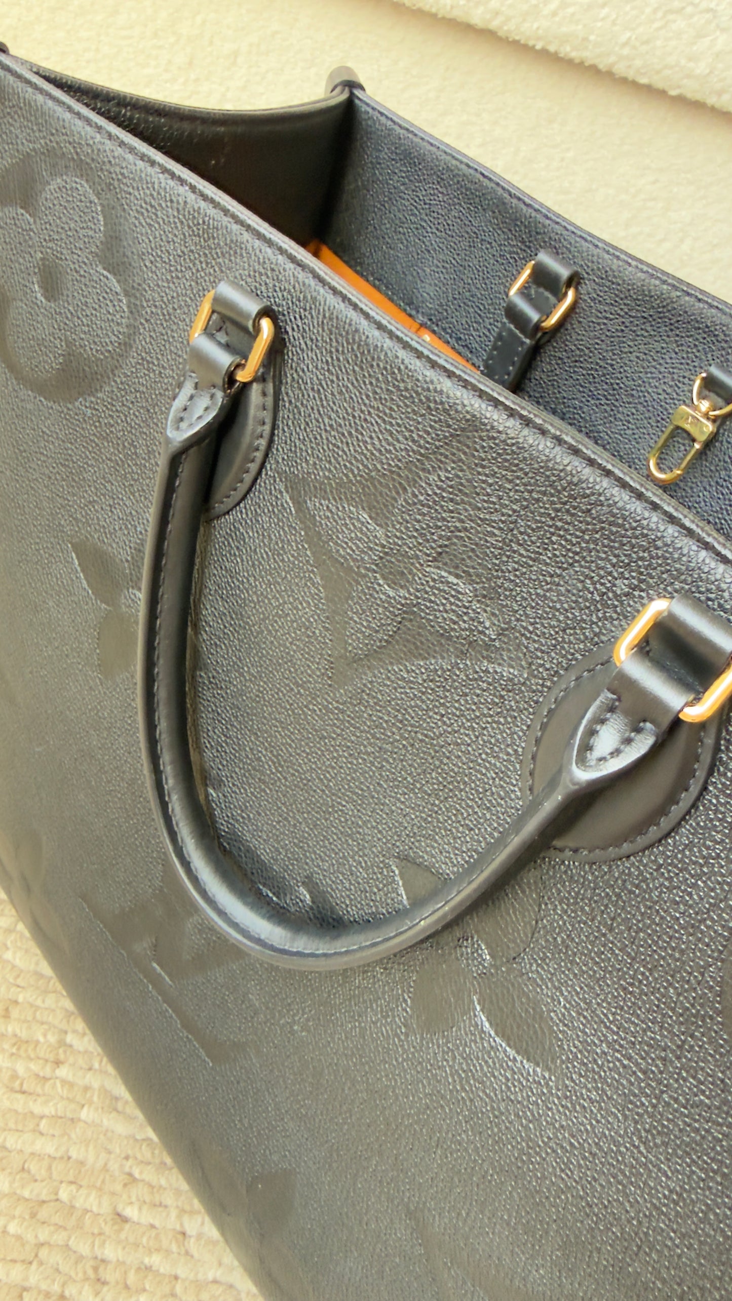 ONTHEGO GM BLACK EMPREINTE BAG