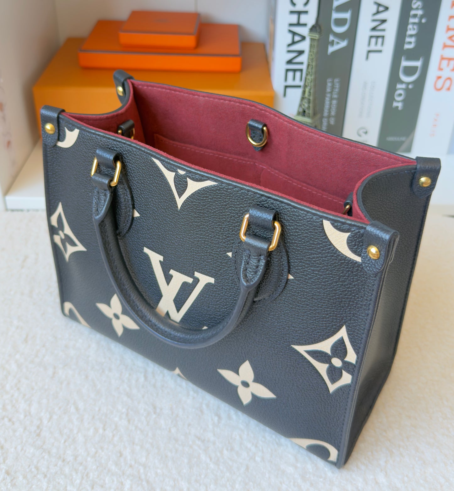 ONTHEGO PM BLACK/BEIGE EMPREINTE BAG