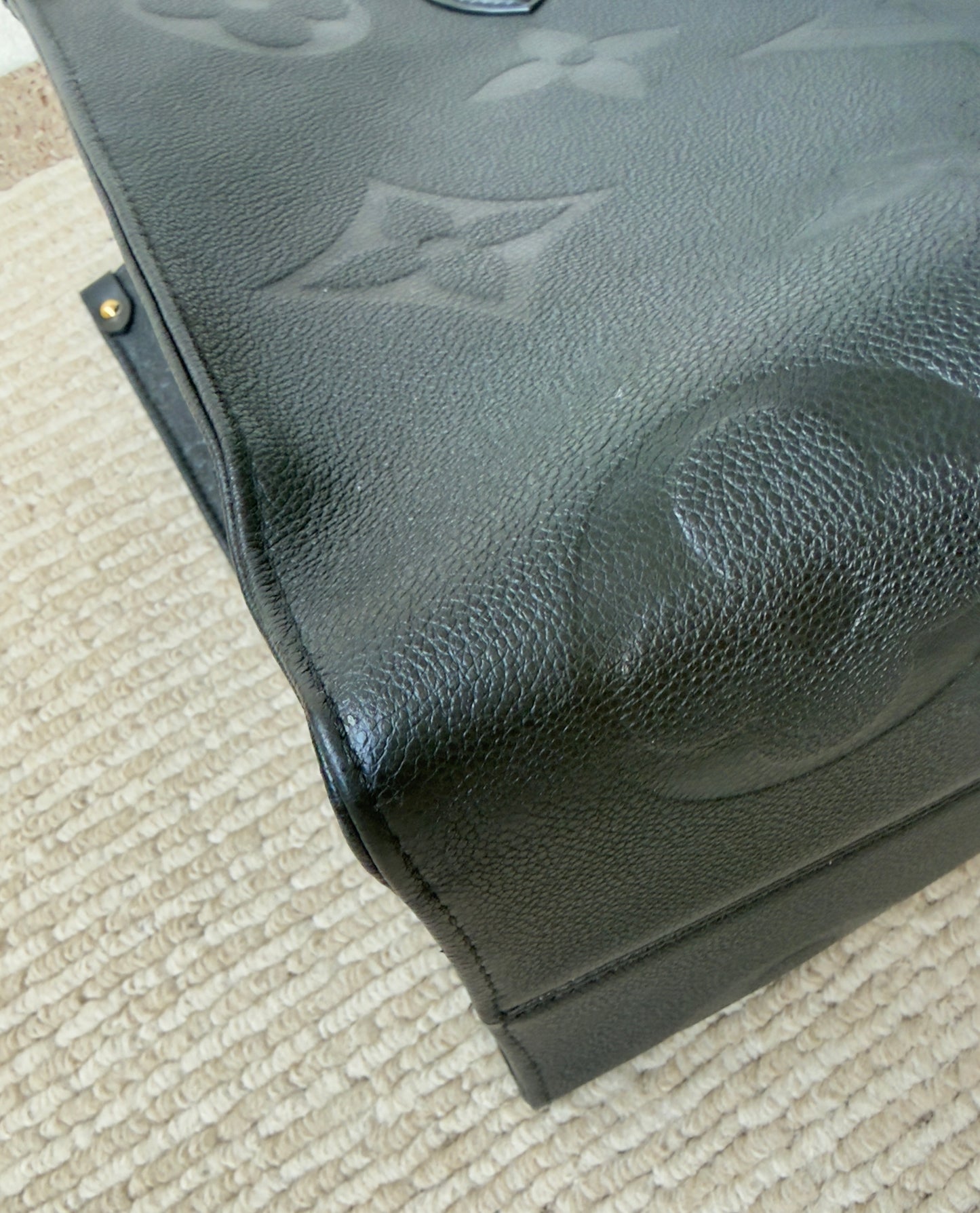 ONTHEGO GM BLACK EMPREINTE BAG
