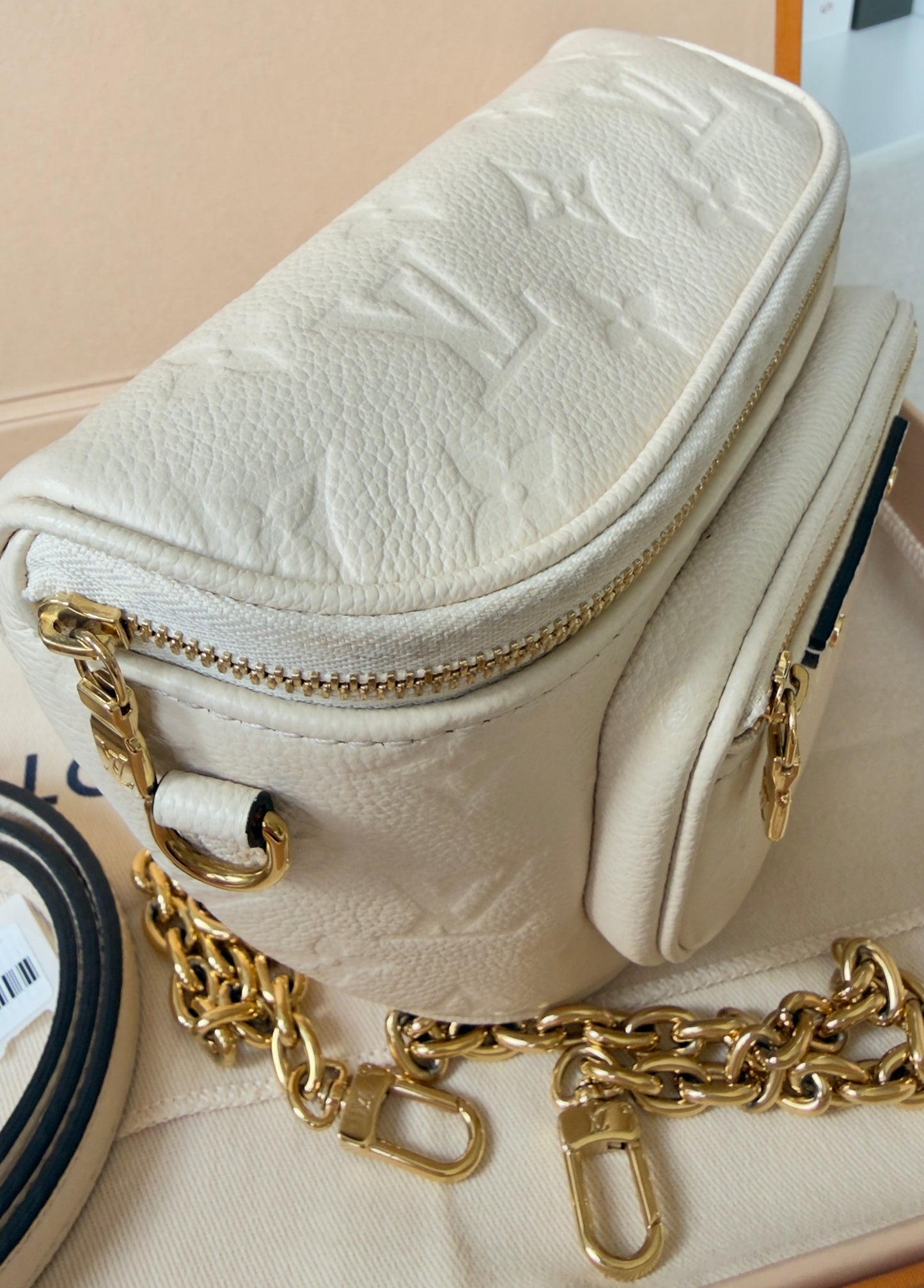 Mini Monogram Empreinte Leather Cream Bumbag