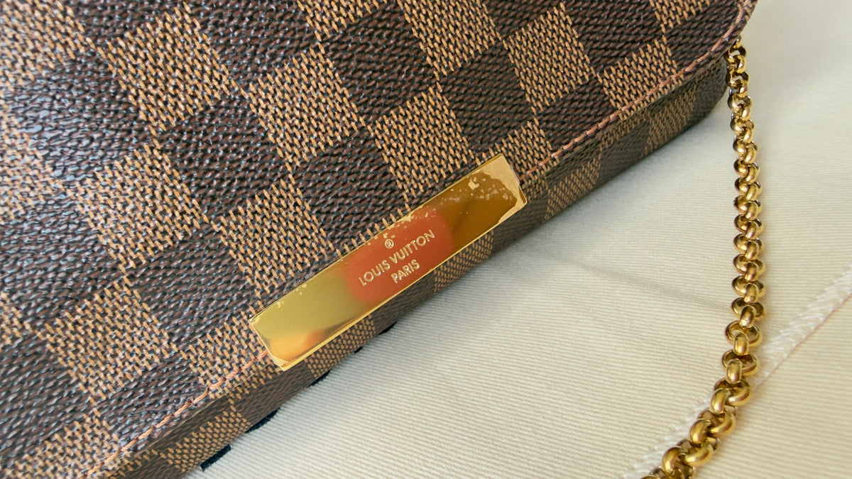 FAVORITE PM DAMIER EBENE CLUTCH/CROSSBODY BAG