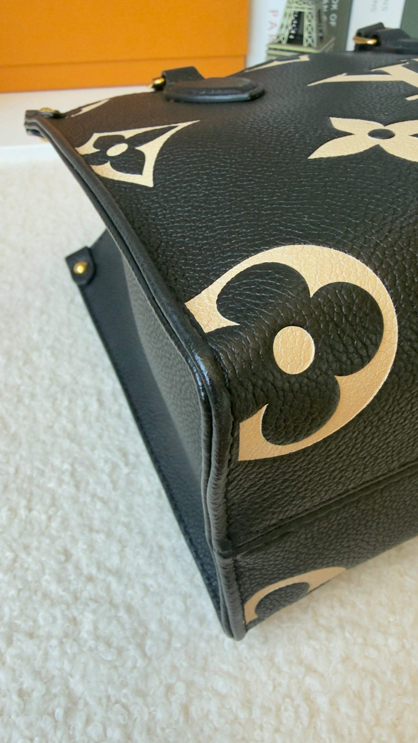 ONTHEGO PM BLACK/BEIGE EMPREINTE BAG