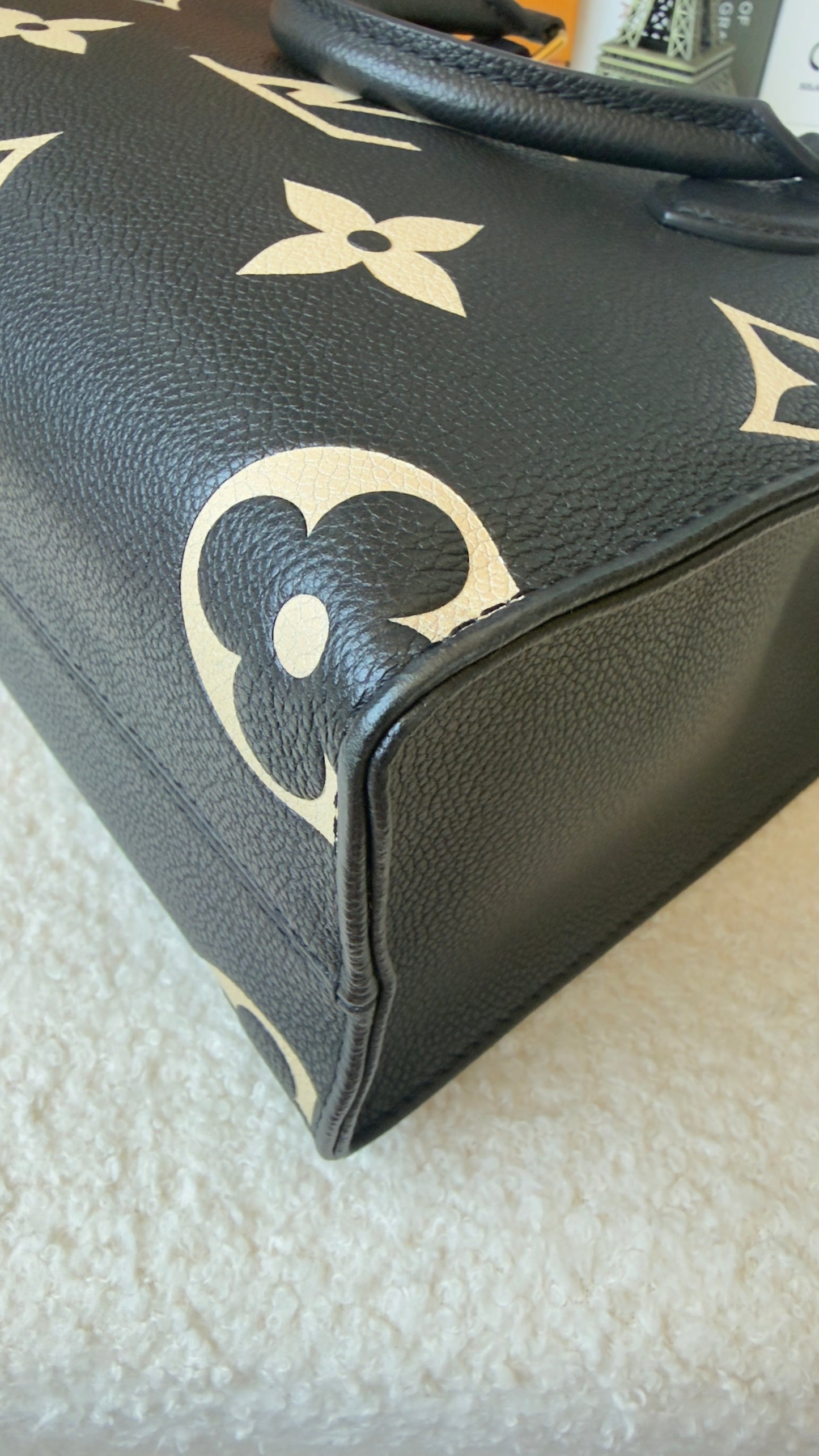 ONTHEGO PM BLACK/BEIGE EMPREINTE BAG
