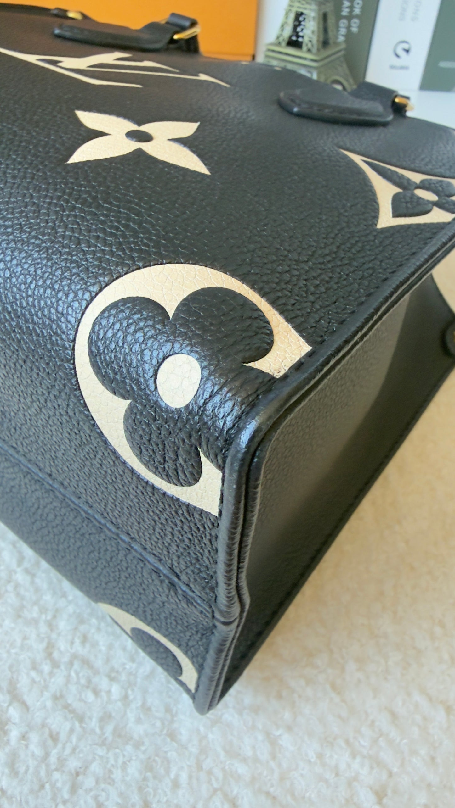 ONTHEGO PM BLACK/BEIGE EMPREINTE BAG