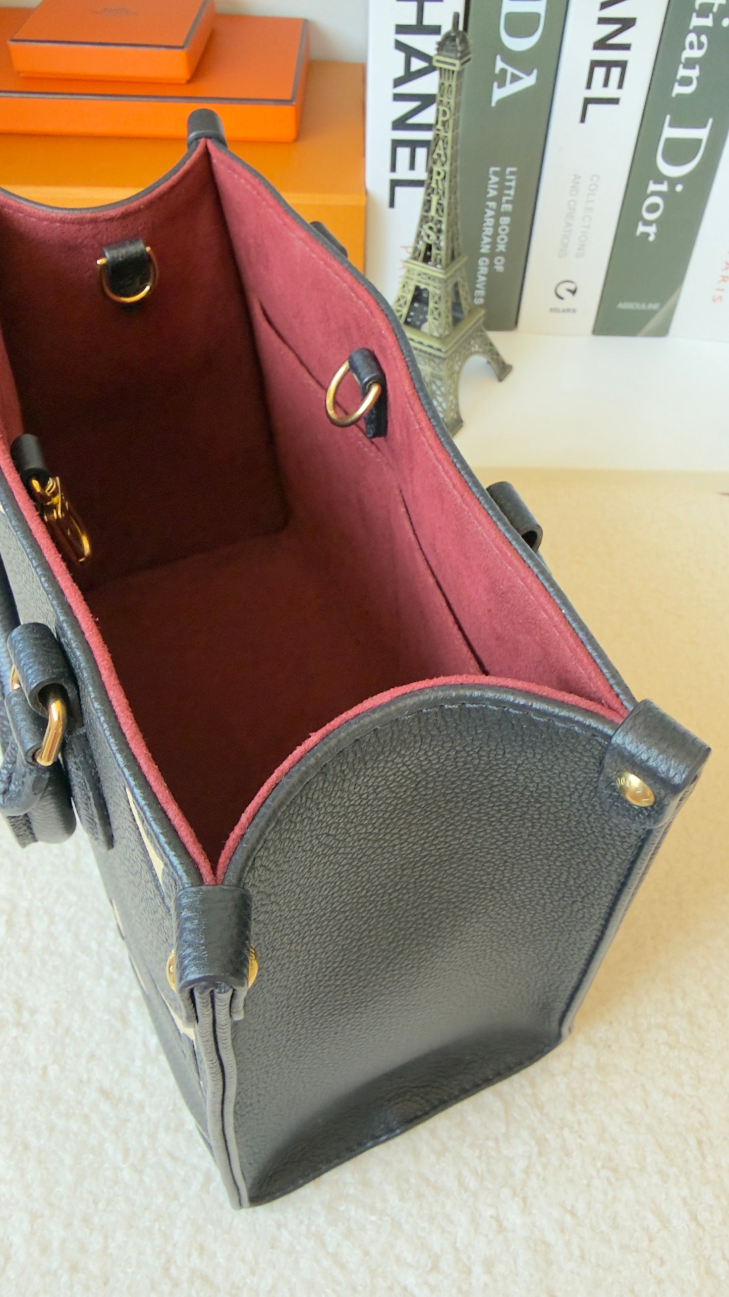 ONTHEGO PM BLACK/BEIGE EMPREINTE BAG