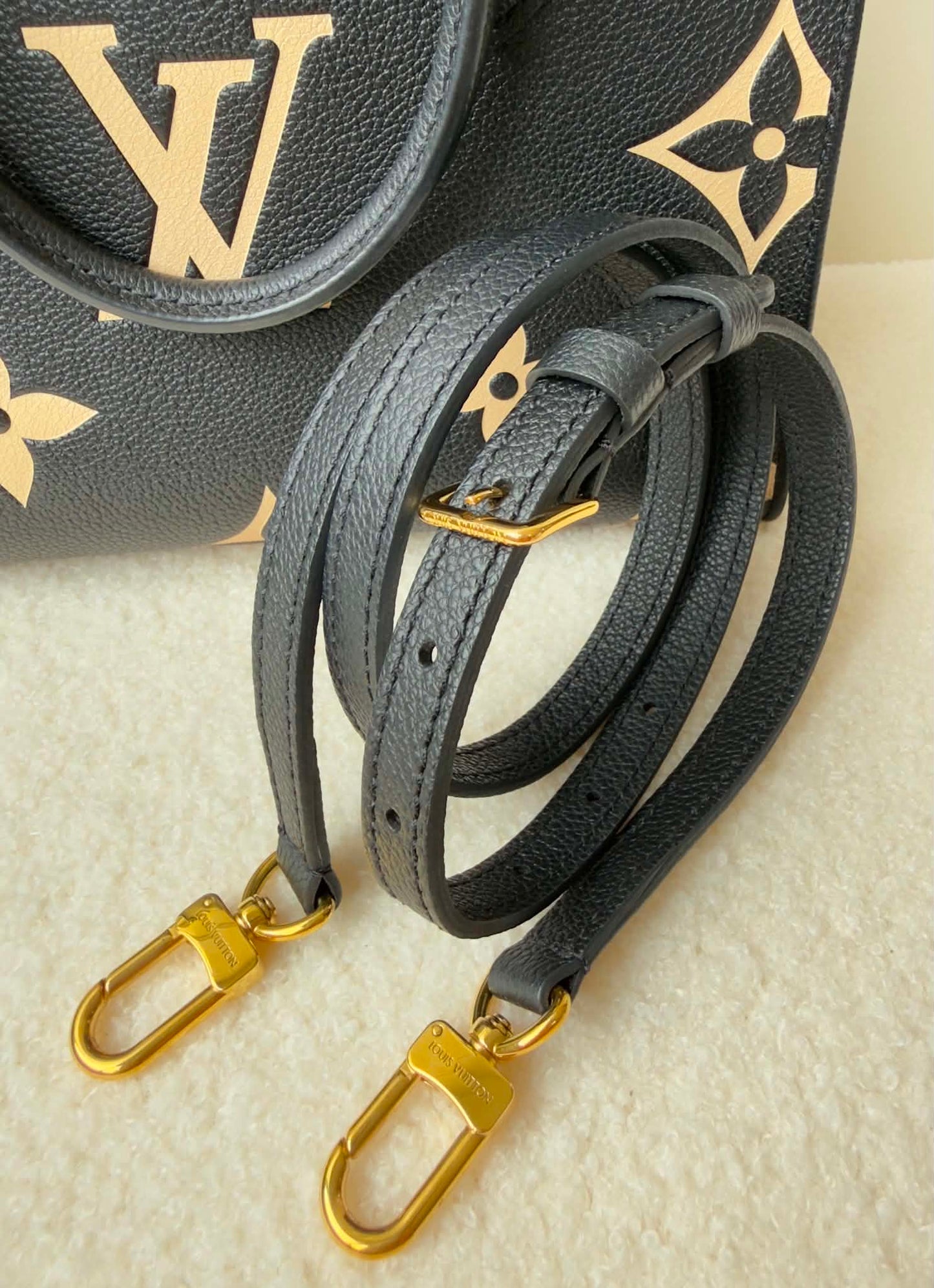 ONTHEGO PM BLACK/BEIGE EMPREINTE BAG